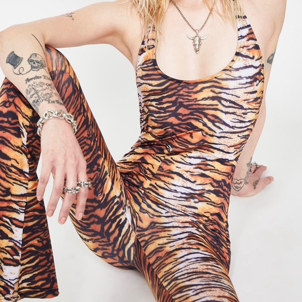 ✨ HOROSCOPES // DOLLS KILL • tiger print bell bottom halter jumpsuit